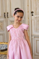 Logo de Maloko Kids Perú, tienda de vestidos, zapatos y accesorios para niñas